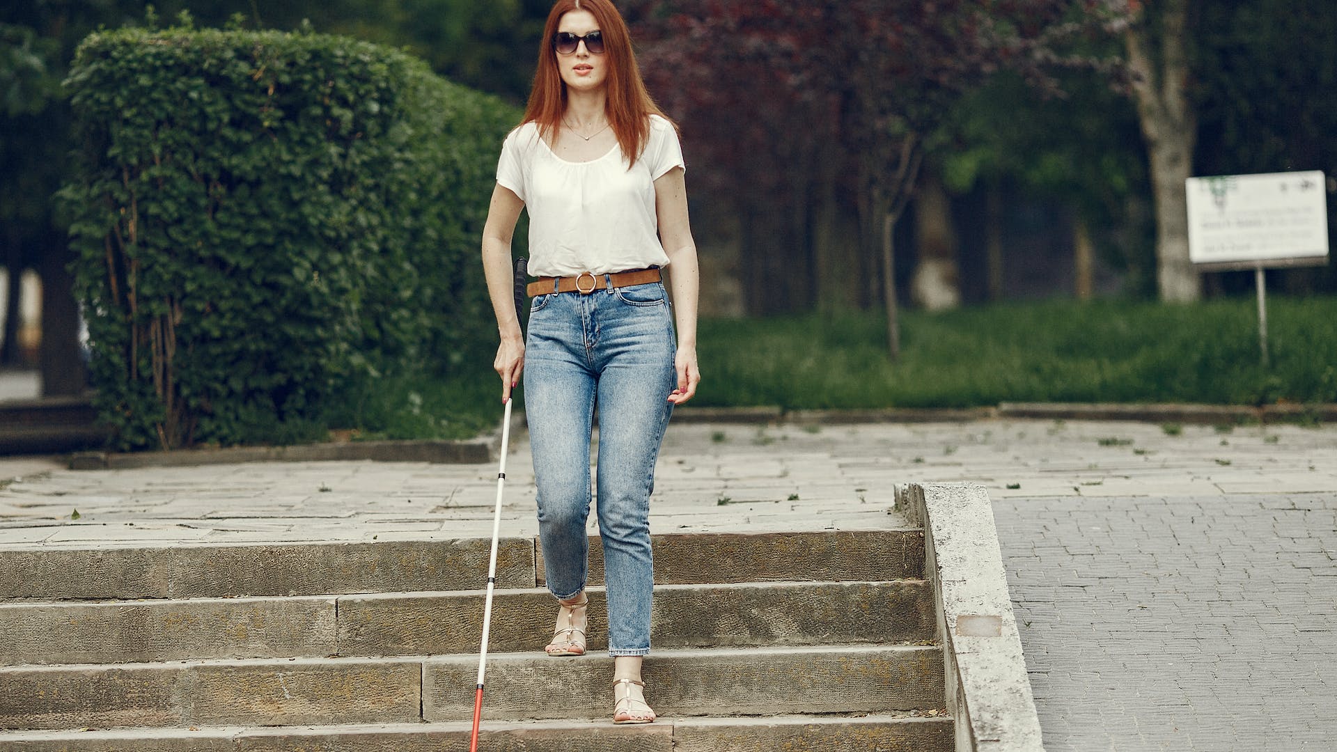 Woman Walking Blind with Cane
