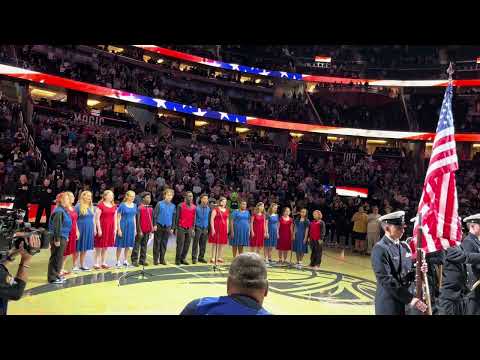 FSDB Blinding Lights Show Choir singing the National Anthem at the Orlando Magic game.